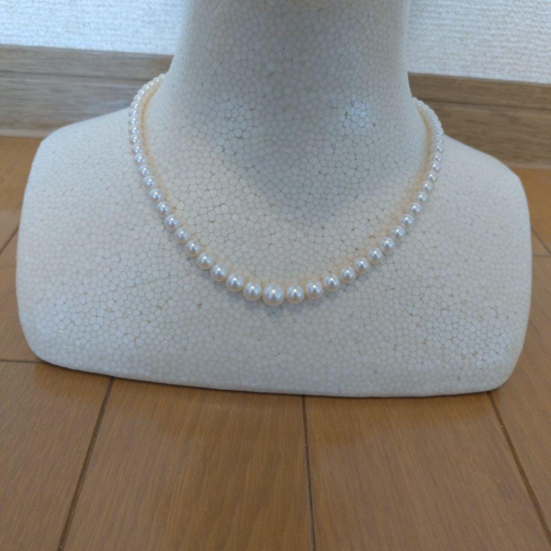 Akoya genuine pearl necklace with white pearls and silver clasp single strand design