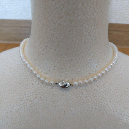 Akoya genuine pearl necklace with white pearls and silver clasp single strand design