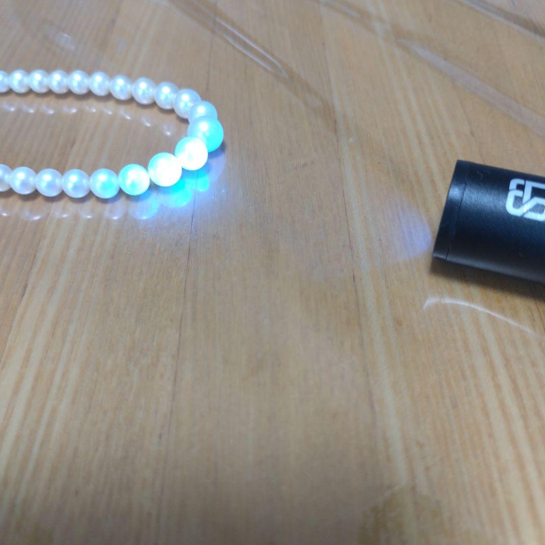 Akoya genuine pearl necklace with white pearls and silver clasp single strand design