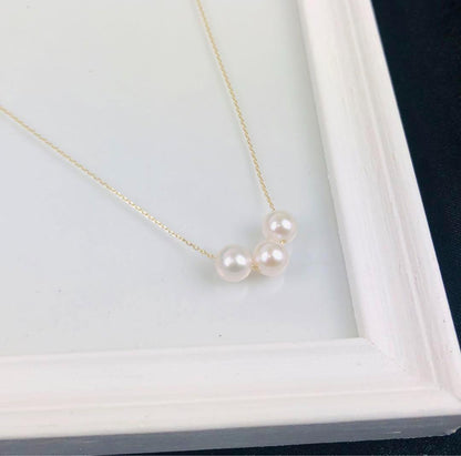 K18 18-karat gold necklace with three rows of 6.5mm Akoya pearls and 40cm chain