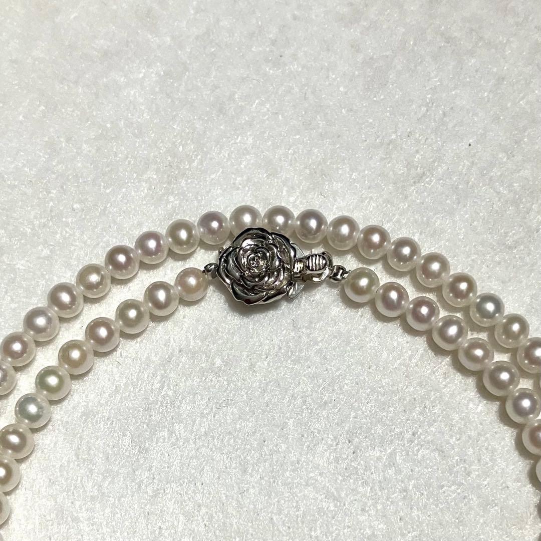 Aqua Baby Akoya Pearl Necklace 4.0mm white pearls with flower motif silver mark, 42cm length