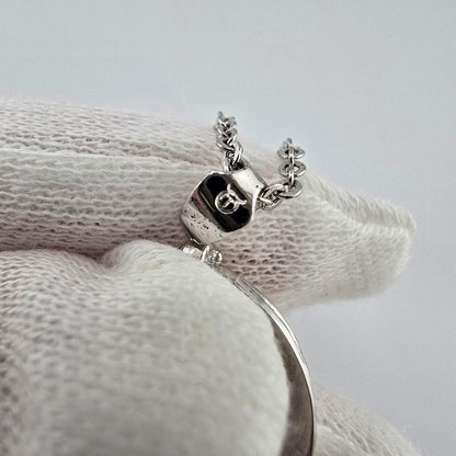 Vintage MIKIMOTO silver necklace with three 4mm pearls on a 23cm chain with engraved clasp