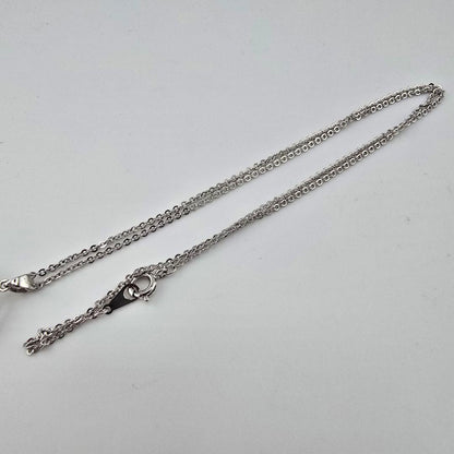 Vintage MIKIMOTO silver necklace with three 4mm pearls on a 23cm chain with engraved clasp