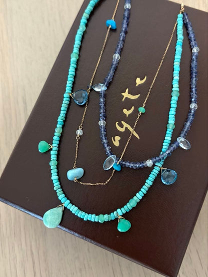 Agete 3-row necklace with turquoise, larimar, blue topaz, tanzanite, and quartz stones in blue tones on K10 gold