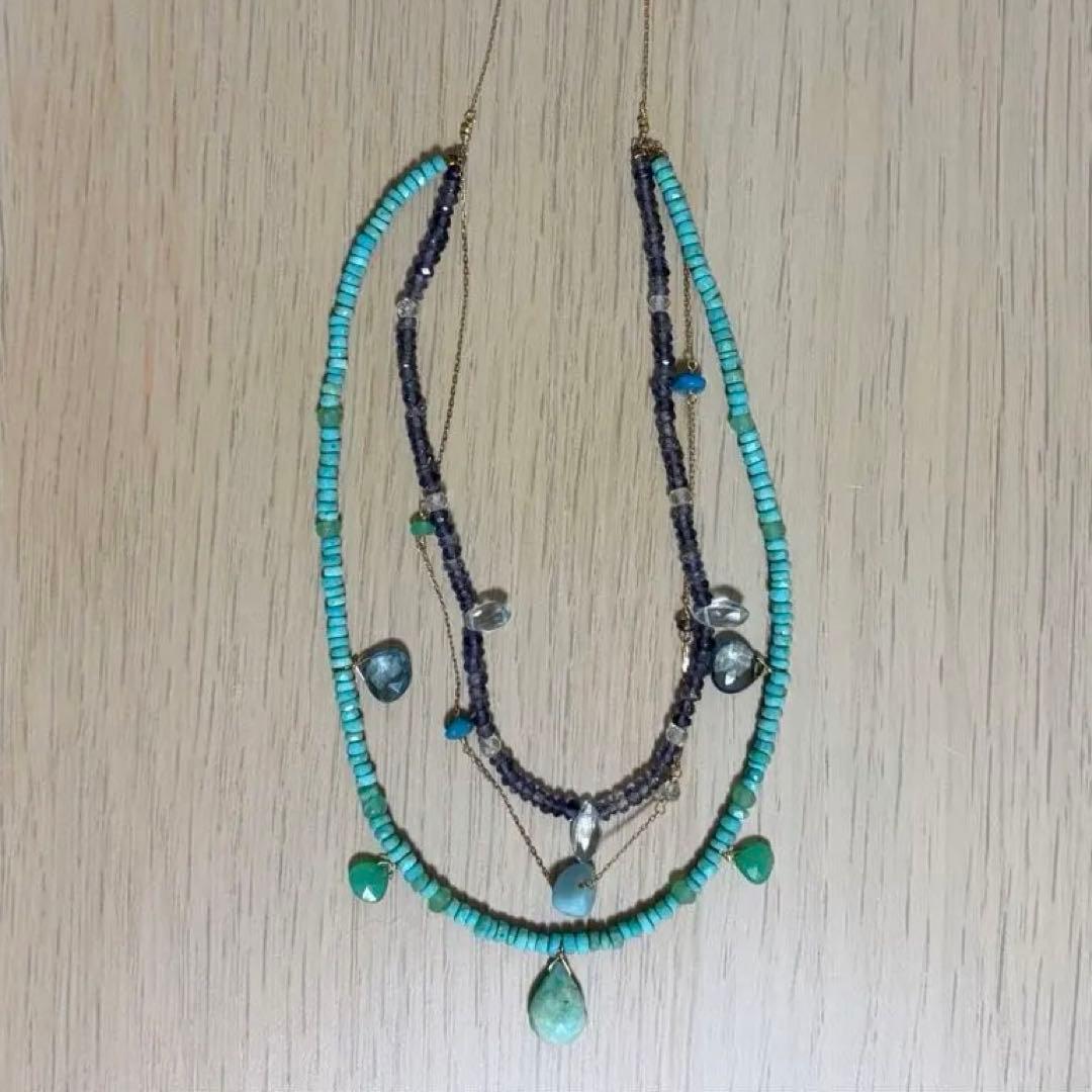Agete 3-row necklace with turquoise, larimar, blue topaz, tanzanite, and quartz stones in blue tones on K10 gold