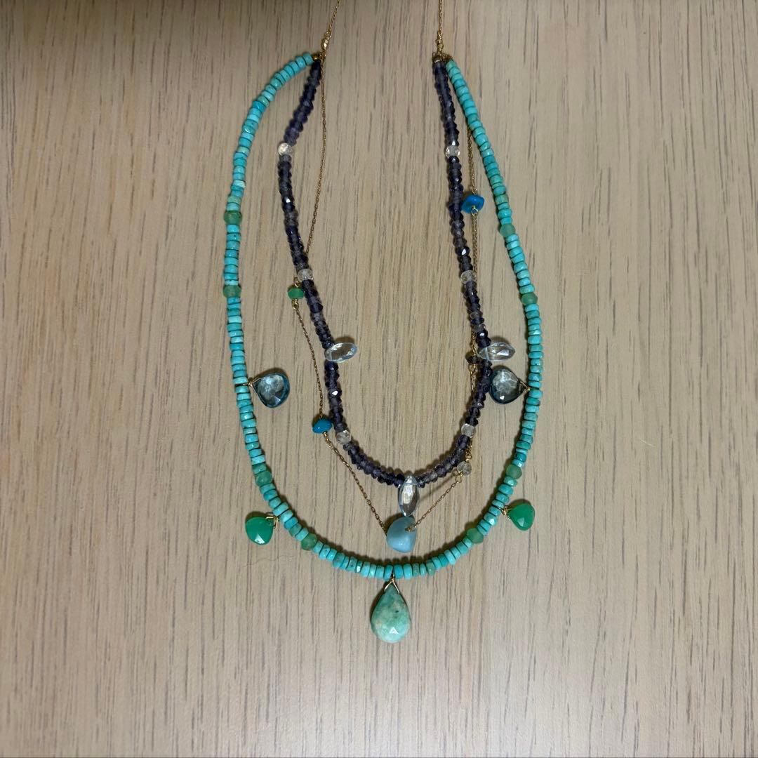 Agete 3-row necklace with turquoise, larimar, blue topaz, tanzanite, and quartz stones in blue tones on K10 gold