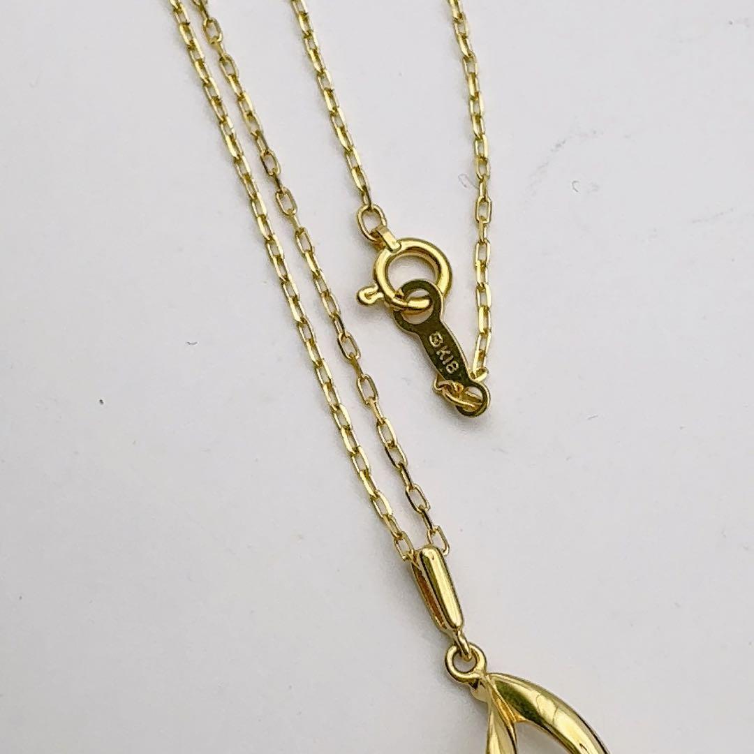 MIKIMOTO K18 necklace featuring 5.0-6.1mm pearls on a 40cm chain with a 2.7cm top pendant