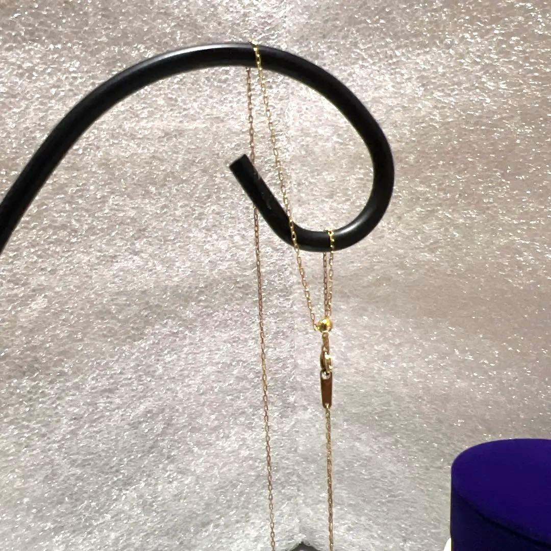 Agete K18 diamond crescent moon necklace with 48cm length displayed on a white background