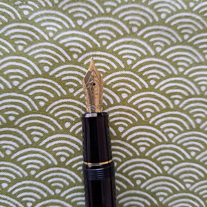Pilot fountain pen with 10 B nib and 585 karat gold tip in clean condition with slight ink marks