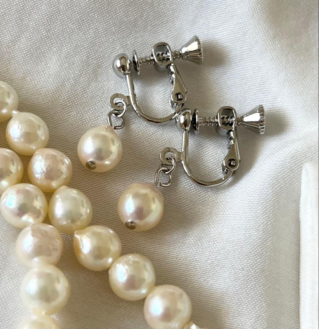 Akoya pearl necklace and earring set with 6.5 to 7 mm pearls, stainless steel clasp, and rhodium plated screw-back earrings