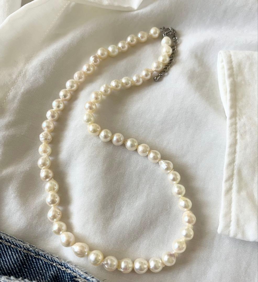 Akoya pearl necklace and earring set with 6.5 to 7 mm pearls, stainless steel clasp, and rhodium plated screw-back earrings