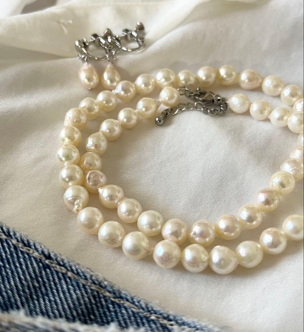Akoya pearl necklace and earring set with 6.5 to 7 mm pearls, stainless steel clasp, and rhodium plated screw-back earrings