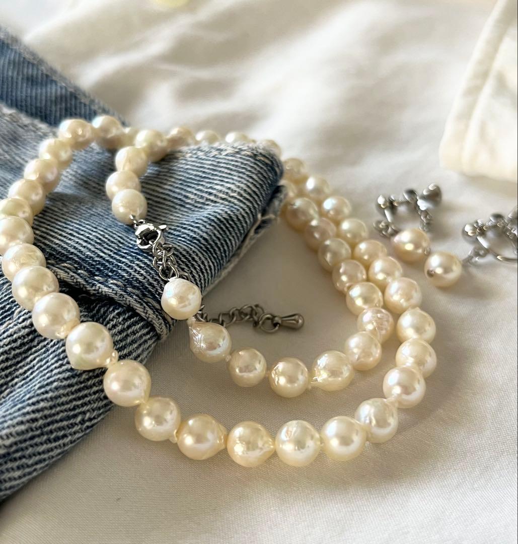 Akoya pearl necklace and earring set with 6.5 to 7 mm pearls, stainless steel clasp, and rhodium plated screw-back earrings