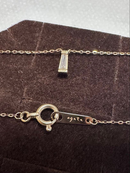 Agete K10 diamond necklace with 0.04ct diamond on 39 cm chain, pendant size 0.55 x 0.2 cm