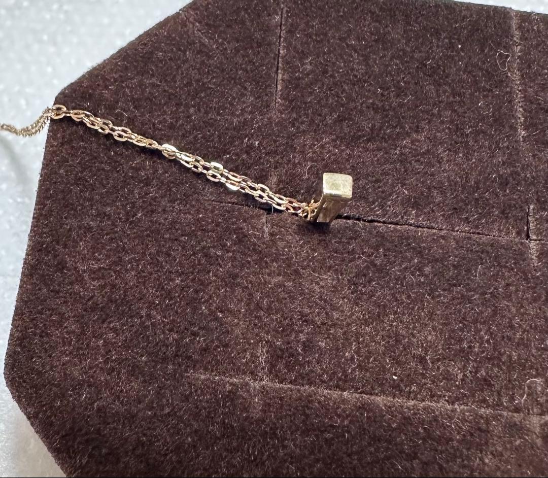 Agete K10 diamond necklace with 0.04ct diamond on 39 cm chain, pendant size 0.55 x 0.2 cm