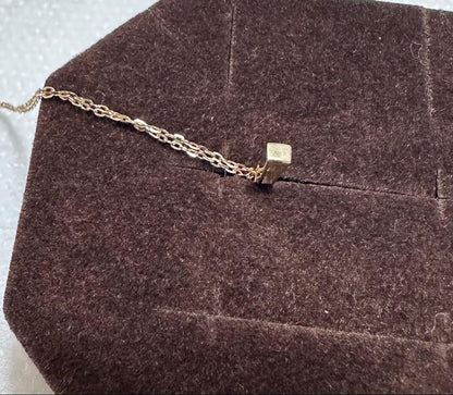 Agete K10 diamond necklace with 0.04ct diamond on 39 cm chain, pendant size 0.55 x 0.2 cm