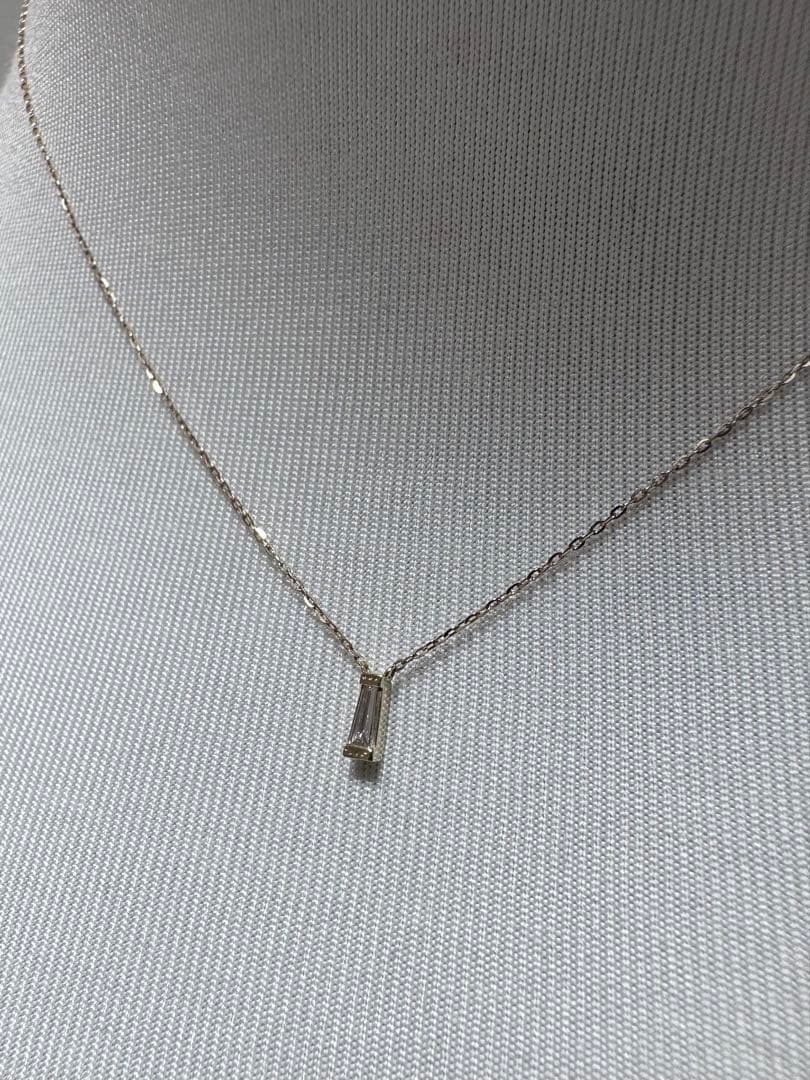Agete K10 diamond necklace with 0.04ct diamond on 39 cm chain, pendant size 0.55 x 0.2 cm