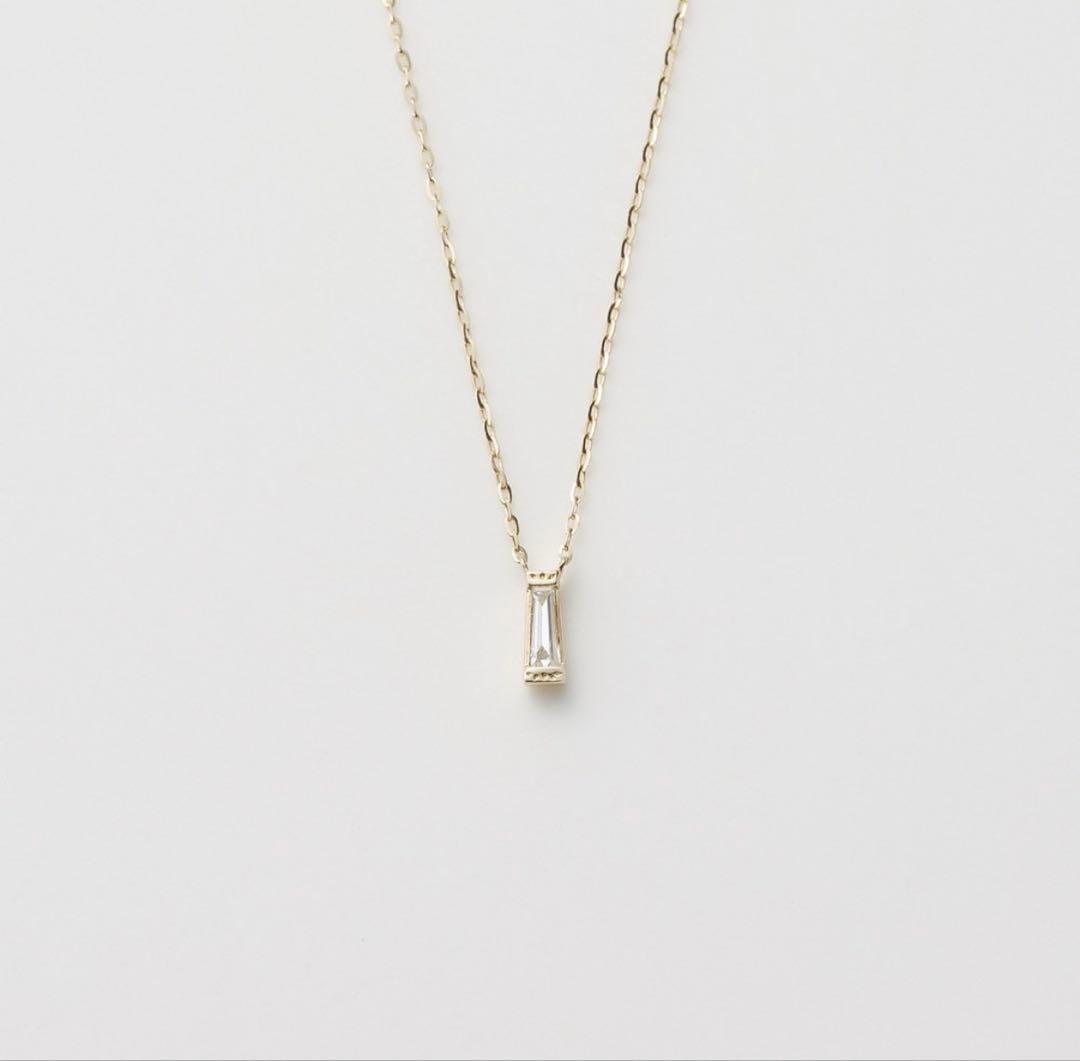 Agete K10 diamond necklace with 0.04ct diamond on 39 cm chain, pendant size 0.55 x 0.2 cm