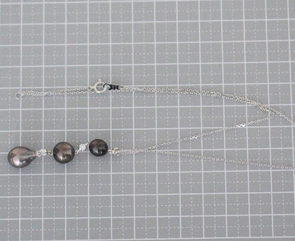 Perleta Mikimoto black pearl necklace with diamond accents on K18 white gold chain, 42cm neck circumference