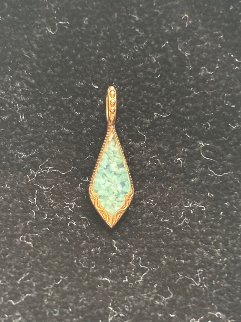 Agate K10 necklace charm with Amber, Turquoise, Larimar stones and shell detail on a silver chain