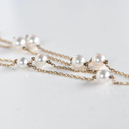 Kuro Pearl Station Necklace featuring nine round pearls with K18 clasp on a 37.5 cm chain