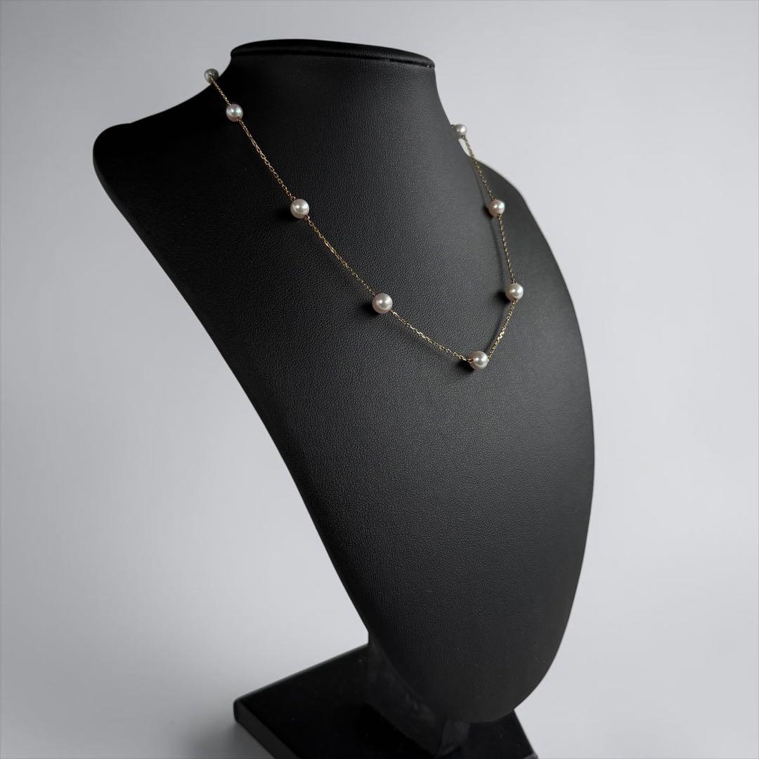 Kuro Pearl Station Necklace featuring nine round pearls with K18 clasp on a 37.5 cm chain