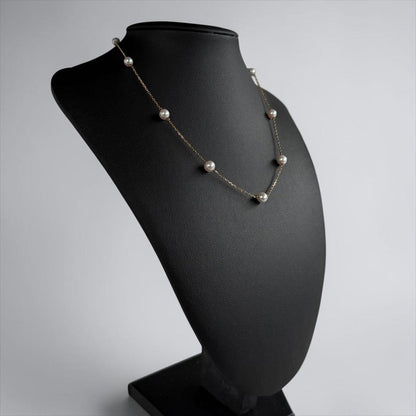Kuro Pearl Station Necklace featuring nine round pearls with K18 clasp on a 37.5 cm chain