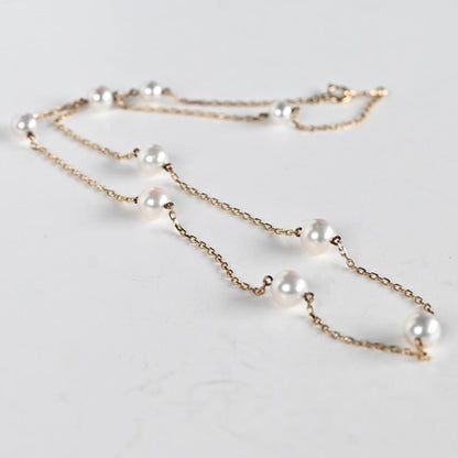 Kuro Pearl Station Necklace featuring nine round pearls with K18 clasp on a 37.5 cm chain