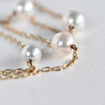 Kuro Pearl Station Necklace featuring nine round pearls with K18 clasp on a 37.5 cm chain
