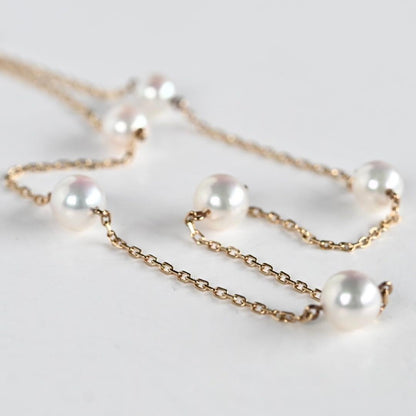 Kuro Pearl Station Necklace featuring nine round pearls with K18 clasp on a 37.5 cm chain