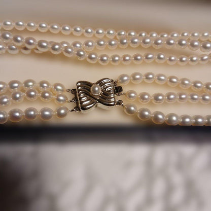 TASAKI White Pearl 3-Row Necklace featuring three rows of 4mm baby white pearls at 42cm length