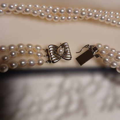 TASAKI White Pearl 3-Row Necklace featuring three rows of 4mm baby white pearls at 42cm length