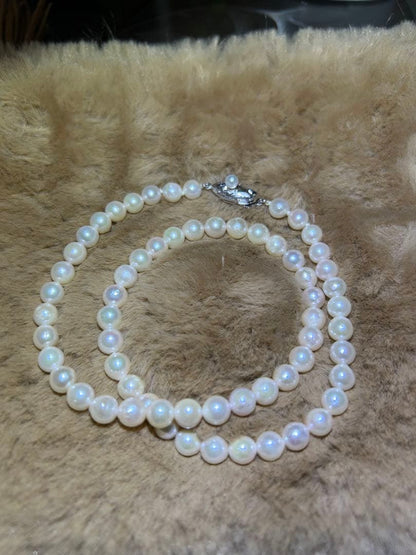 Akoya pearl necklace with silver marking featuring 6mm pearls and 41cm length