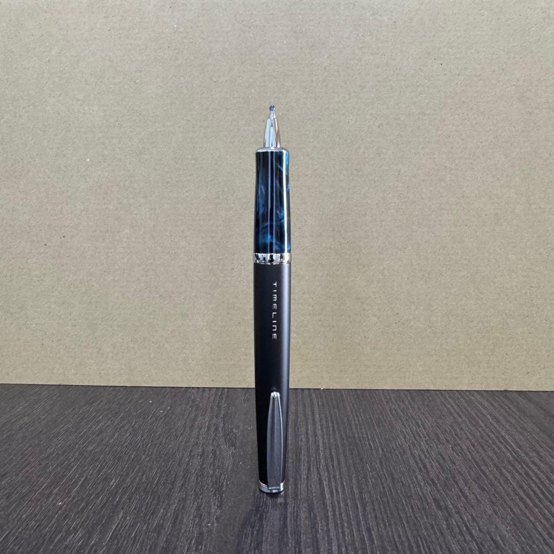 PILOT TIMELINE ballpoint pen in black blue marble color with rotating push mechanism and marble pattern grip on stand