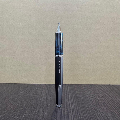 PILOT TIMELINE ballpoint pen in black blue marble color with rotating push mechanism and marble pattern grip on stand
