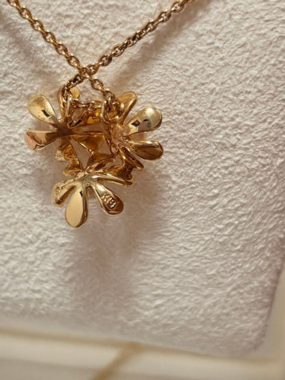 Mikimoto K18 gold baby pearl necklace with 3-row flower motif design weighing 4.5 grams