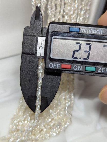 N97 Sorting Akoya pearls 10-string Kesshi necklace with 2-4 mm pearls, 48.5 cm length, displayed on white background