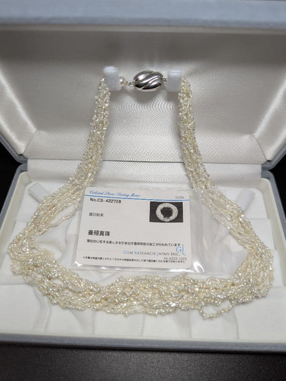 N97 Sorting Akoya pearls 10-string Kesshi necklace with 2-4 mm pearls, 48.5 cm length, displayed on white background