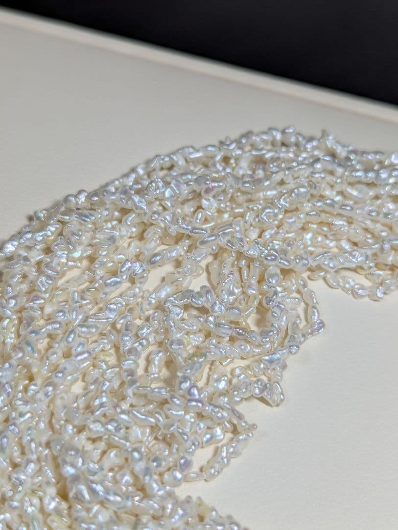 N97 Sorting Akoya pearls 10-string Kesshi necklace with 2-4 mm pearls, 48.5 cm length, displayed on white background