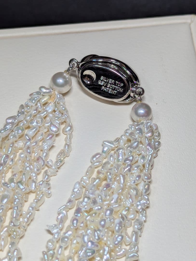 N97 Sorting Akoya pearls 10-string Kesshi necklace with 2-4 mm pearls, 48.5 cm length, displayed on white background