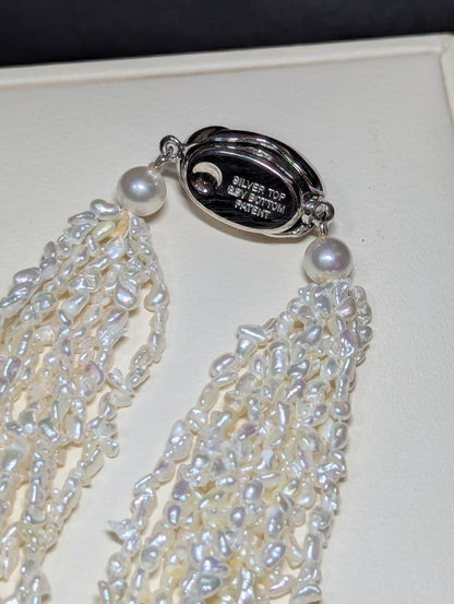 N97 Sorting Akoya pearls 10-string Kesshi necklace with 2-4 mm pearls, 48.5 cm length, displayed on white background