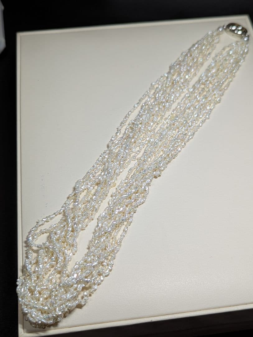 N97 Sorting Akoya pearls 10-string Kesshi necklace with 2-4 mm pearls, 48.5 cm length, displayed on white background