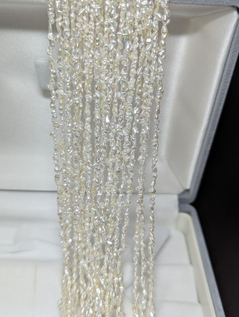 N97 Sorting Akoya pearls 10-string Kesshi necklace with 2-4 mm pearls, 48.5 cm length, displayed on white background