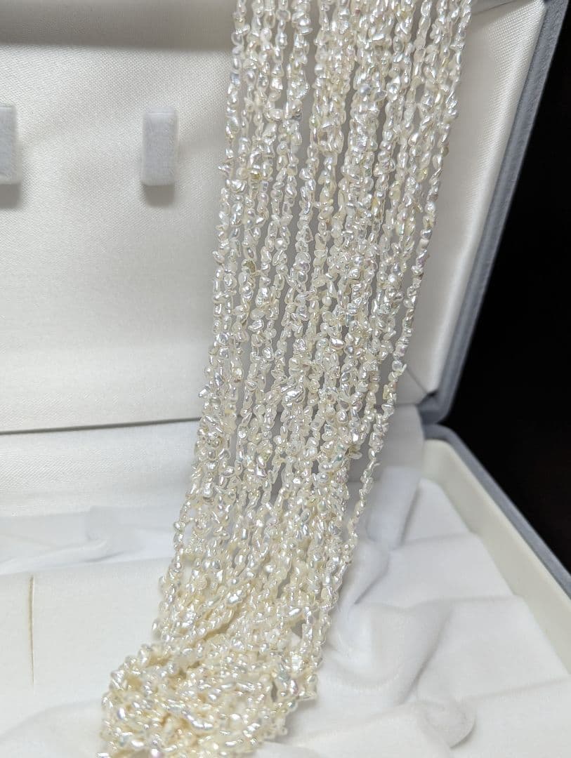 N97 Sorting Akoya pearls 10-string Kesshi necklace with 2-4 mm pearls, 48.5 cm length, displayed on white background