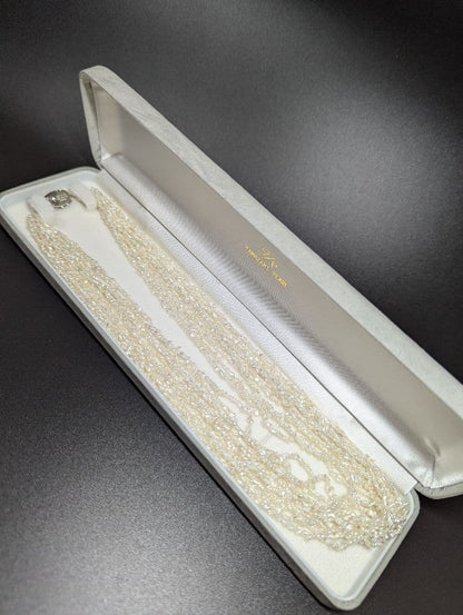 N97 Sorting Akoya pearls 10-string Kesshi necklace with 2-4 mm pearls, 48.5 cm length, displayed on white background
