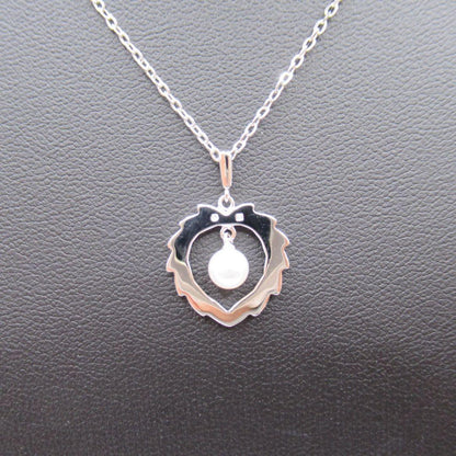 Mikimoto Akoya pearl necklace with single 4.8mm pearl and sterling silver drawstring chain