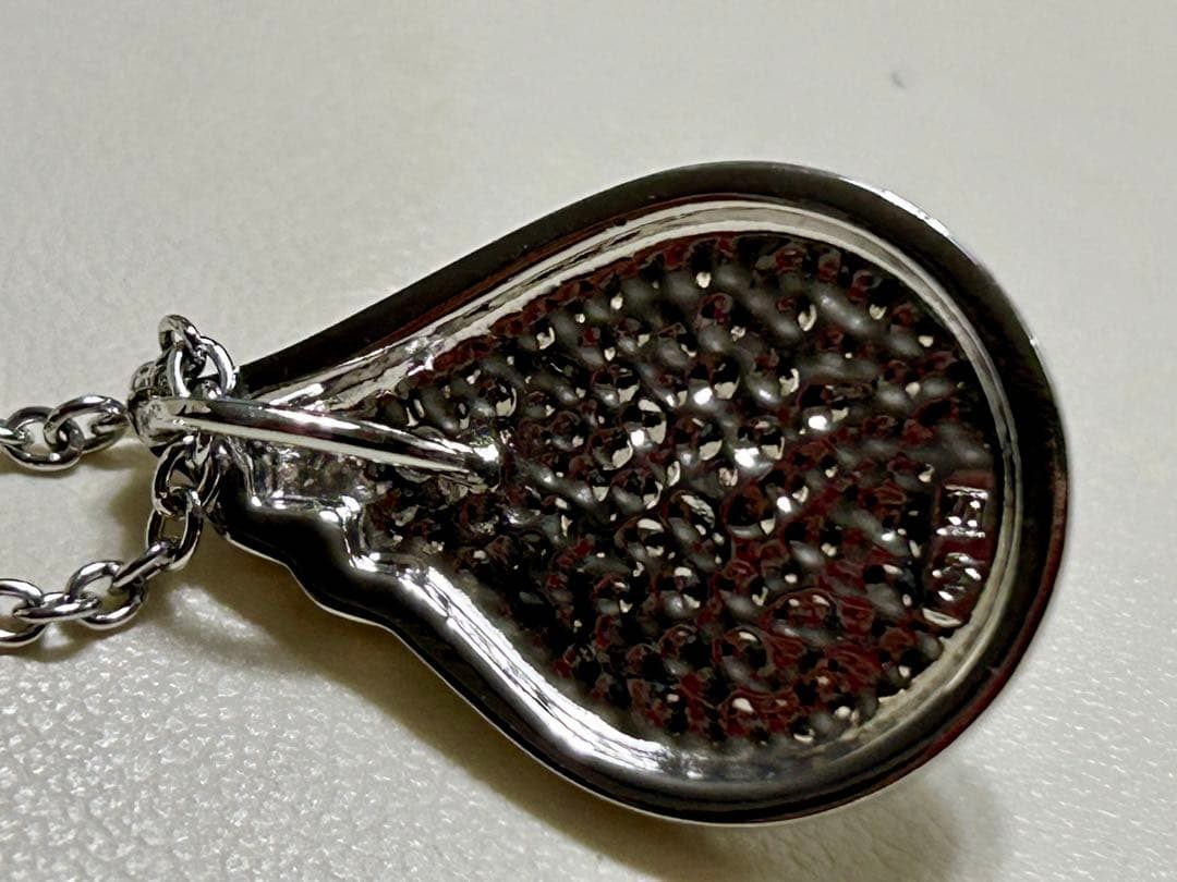 Tasaki pearl necklace with a 12mm Mabe pearl pendant on a silver chain showing Tasaki silver stamp