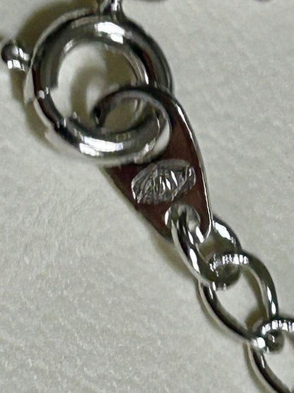 Tasaki pearl necklace with a 12mm Mabe pearl pendant on a silver chain showing Tasaki silver stamp