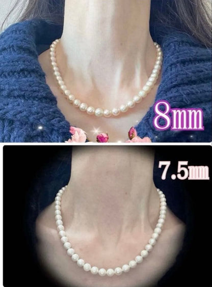 Tsutsumi Aurora Akoya pearl necklace and matching earrings with 8mm round pink-green pearls and silver clasps