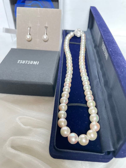 Tsutsumi Aurora Akoya pearl necklace and matching earrings with 8mm round pink-green pearls and silver clasps